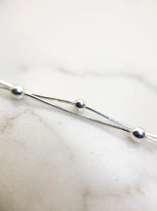 Cadena guía en plata