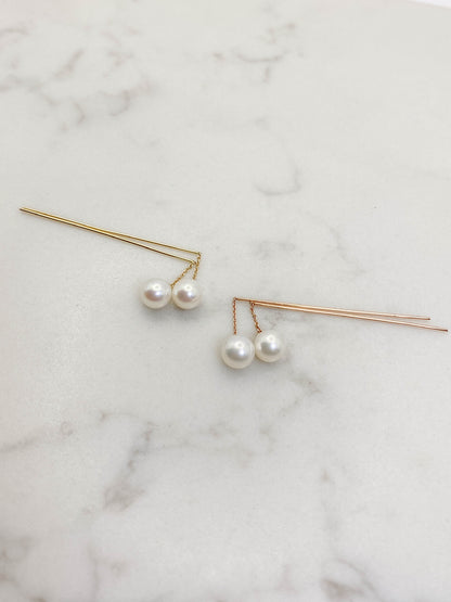 Aretes perlas largas oro 14k